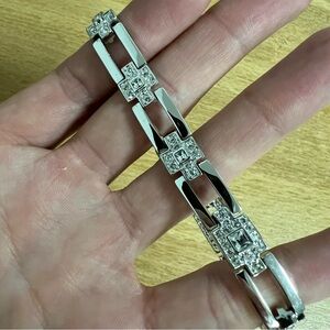 Silver tone chain link art deco rectangle bracelet with rhinestone embellishment